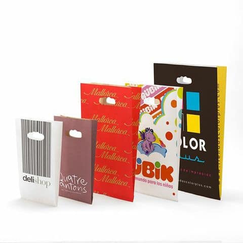 pochettes automatique papier kraft blanc lisse 90grs. Impression de 5 à 110_ d_encrage. Option poignées découpées